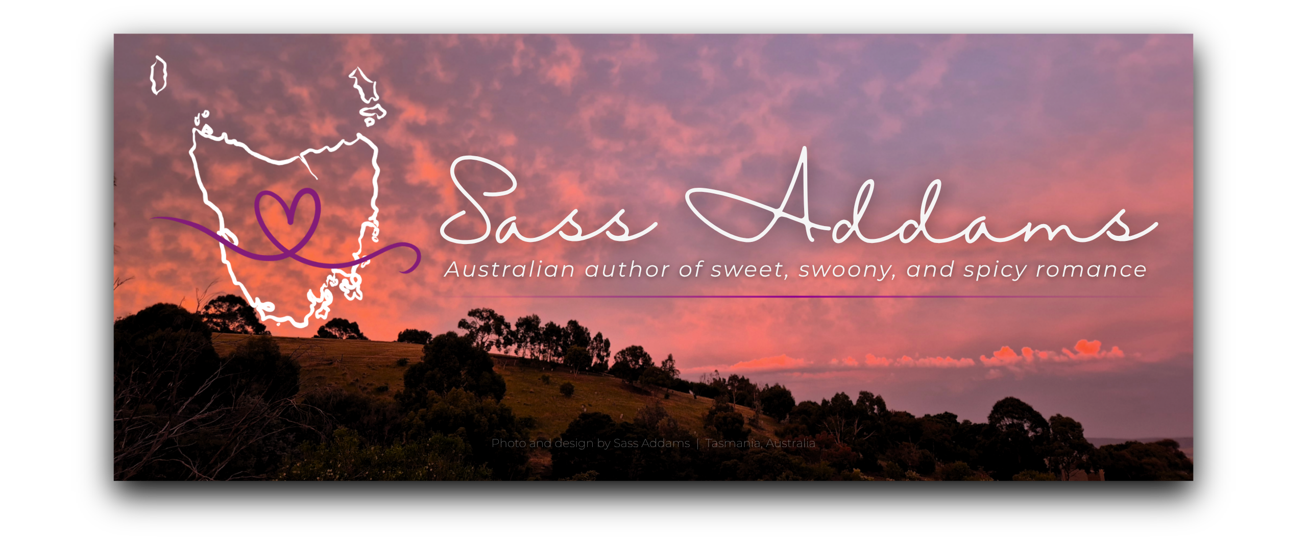 Banner logo: outline of Tasmania with a heart threading through the centre. Banner text: Sass Addams Romance Author. Sweet, swoony, and spicy stories with an Aussie twist. Banner background: a colourful sunset sky with fluffy clouds above a rolling hill.