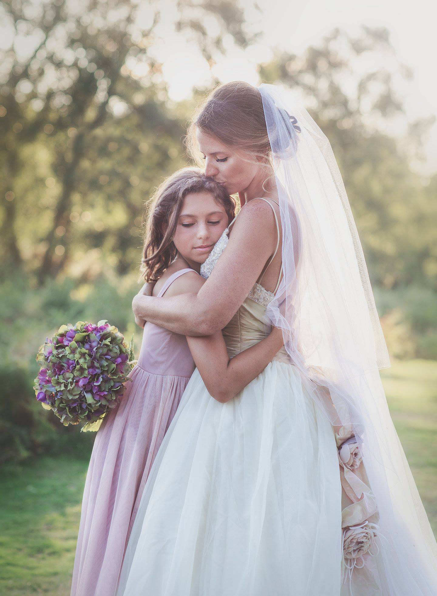 Mother and daughter embracing during sunset wedding, relaxed boho photography by The Photography Boutique