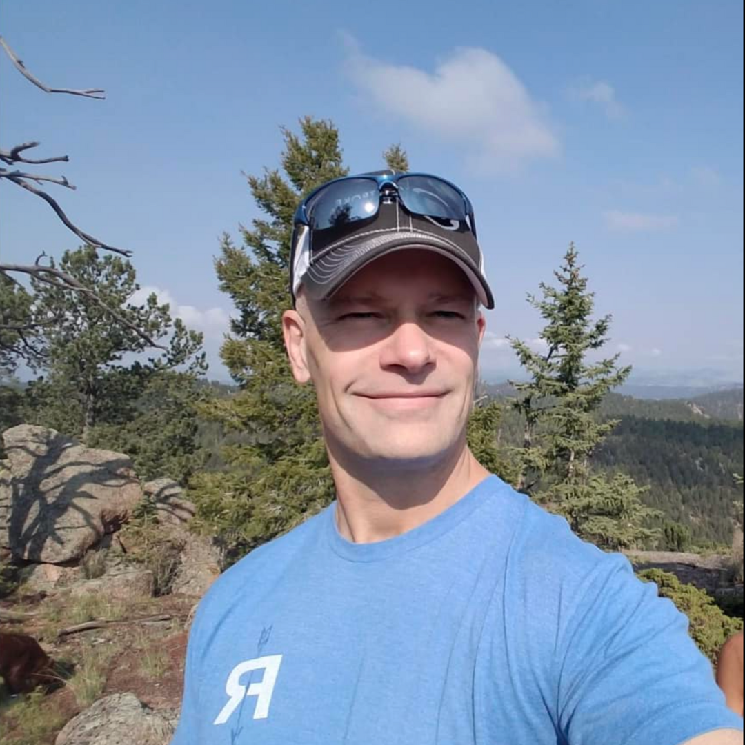 Scott Moon outdoors in the mountains
