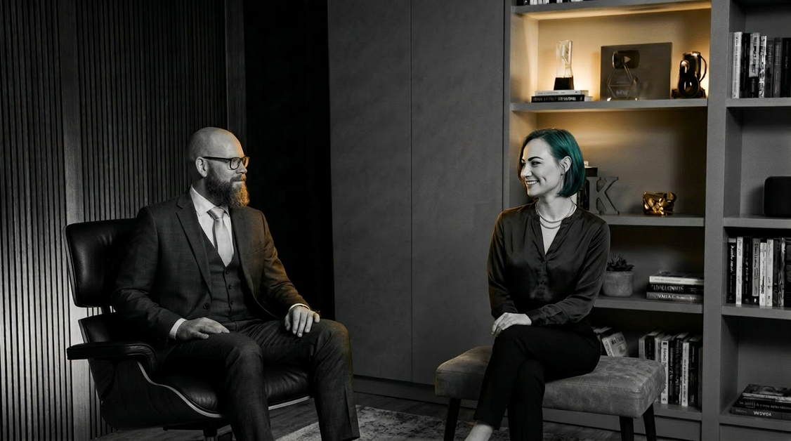 Section banner titled 'The Interactive Tech Guide' detailing the 'Rewire to Rise × AI Portalen Collaboration'. The text describes a structured, cross-platform partnership translating complex AI governance into 15-minute operational masterclasses. Below the description, a white card contains a black and white photograph of Mark Sinclair Fleeton sitting in a modern chair, conversing with Mirela Bocanet who is seated on a bench in front of a bookshelf. To the right of the photo, text reads 'Free masterclass with Mark Sinclair Fleeton' above a pink button labeled 'Explore the Interactive Tech Guide' and a white button labeled 'Read AI Portalen Articles'.