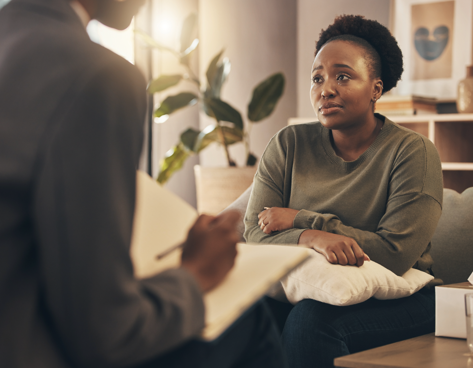 Black woman participating in a therapy session