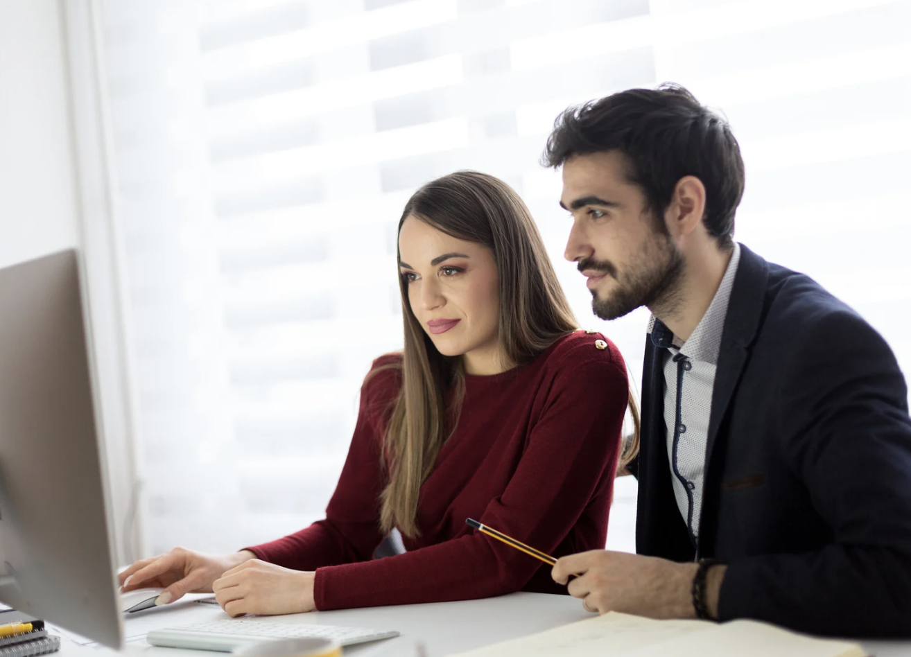 Client reviewing real estate and mortgage documents with advisor