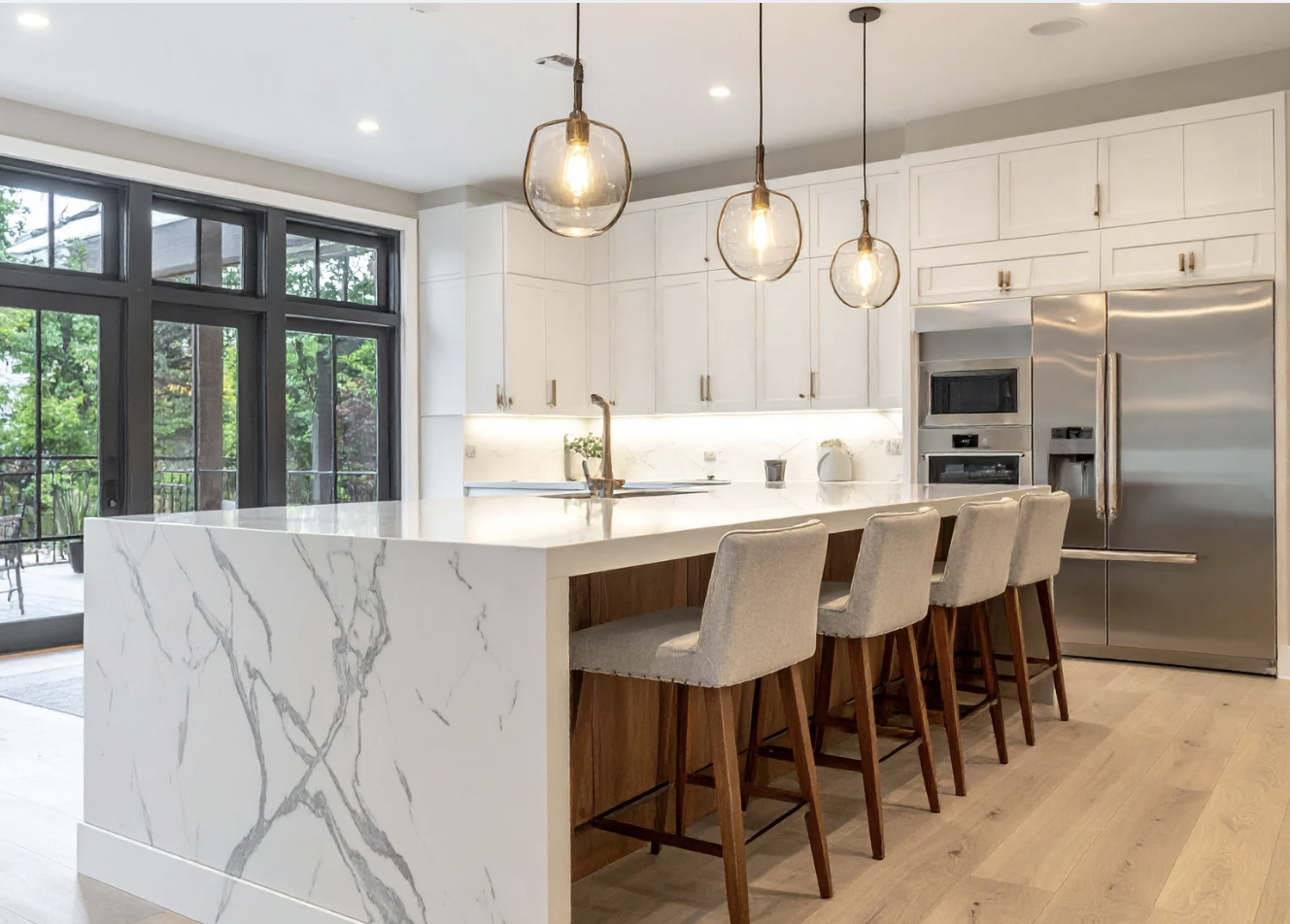 Modern home interior with kitchen island and natural light