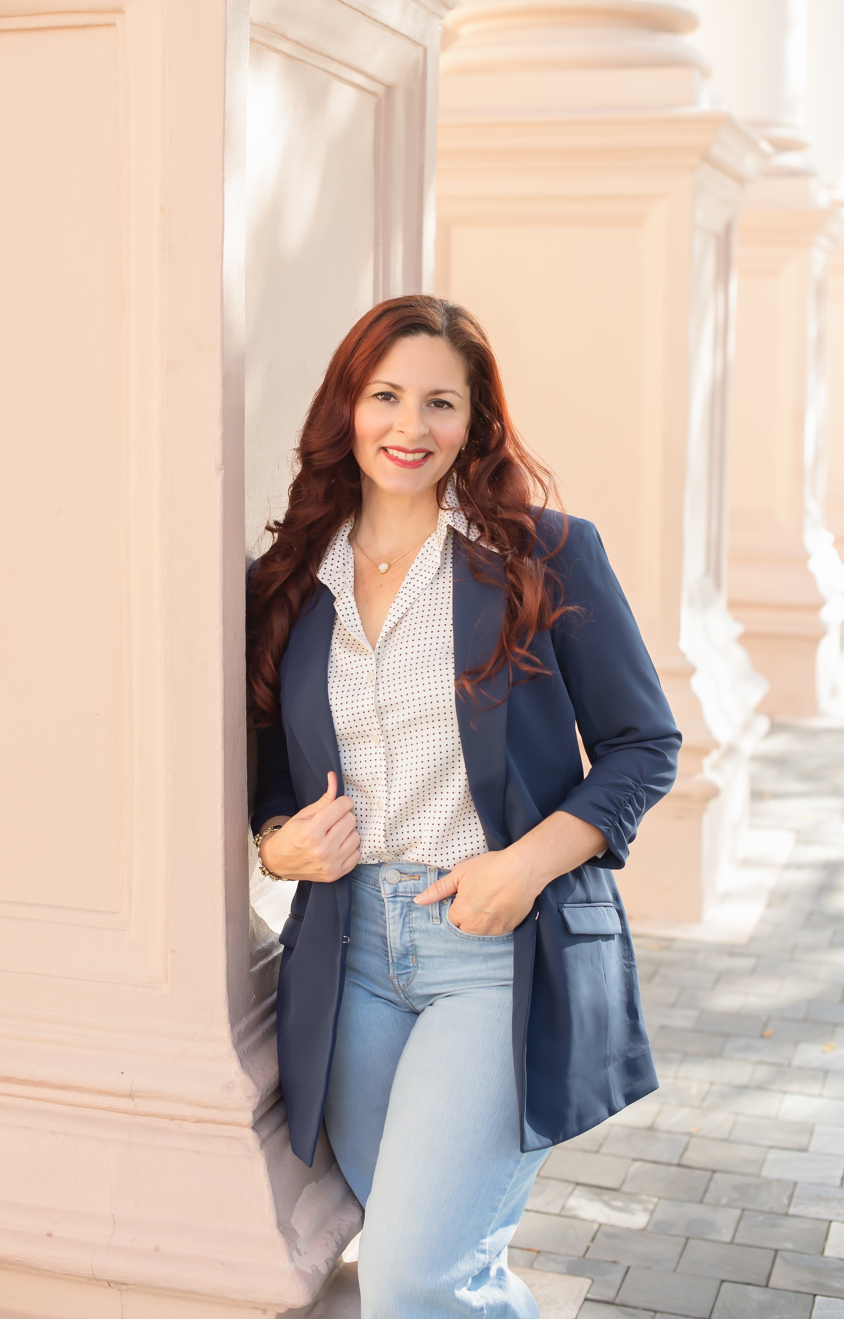 Real estate and mortgage advisor standing outdoors in South Florida