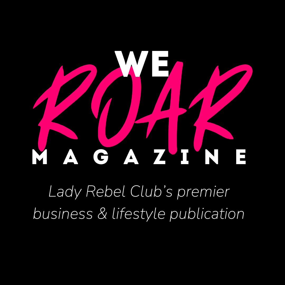 WE ROAR Magazine logo with white lettering and ROAR in hot pink - on black background. Text underneath reads 
