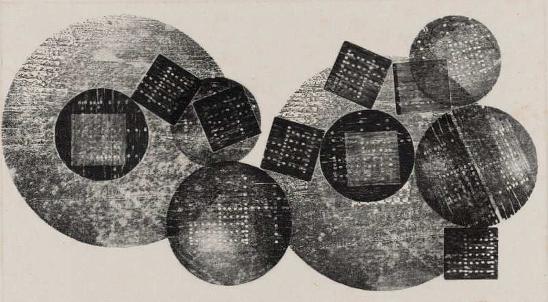A black printed abstract work of circles and squares