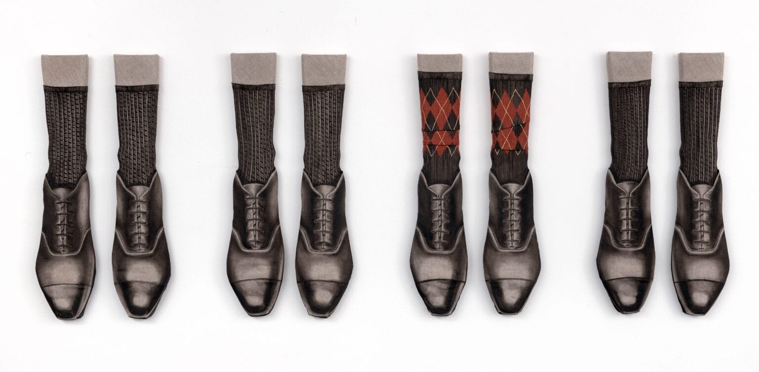 four trompe leoil paintings by Amelia Cross of legs with tall socks and brogues on the feet