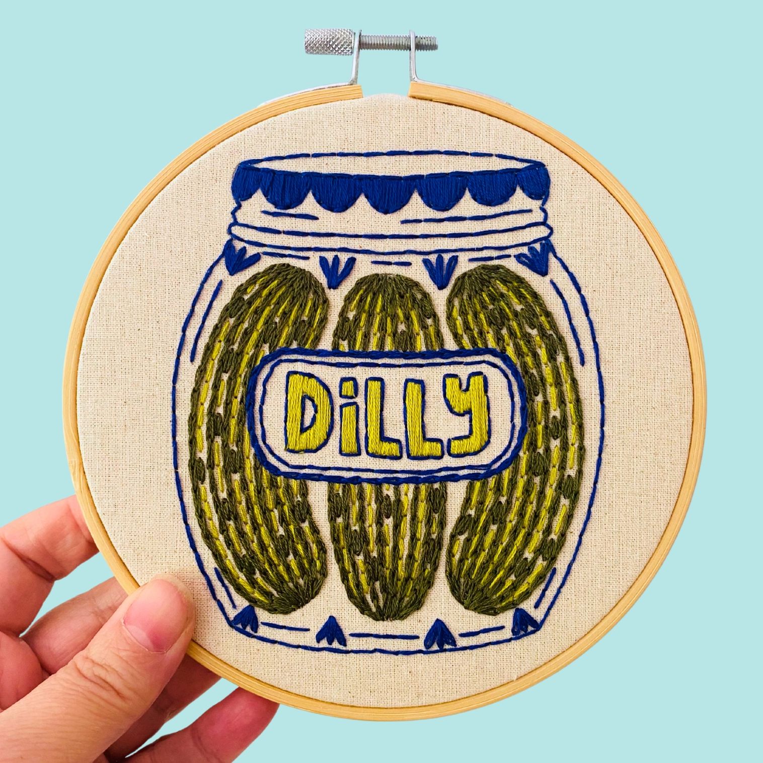 an embroidered pickle jar
