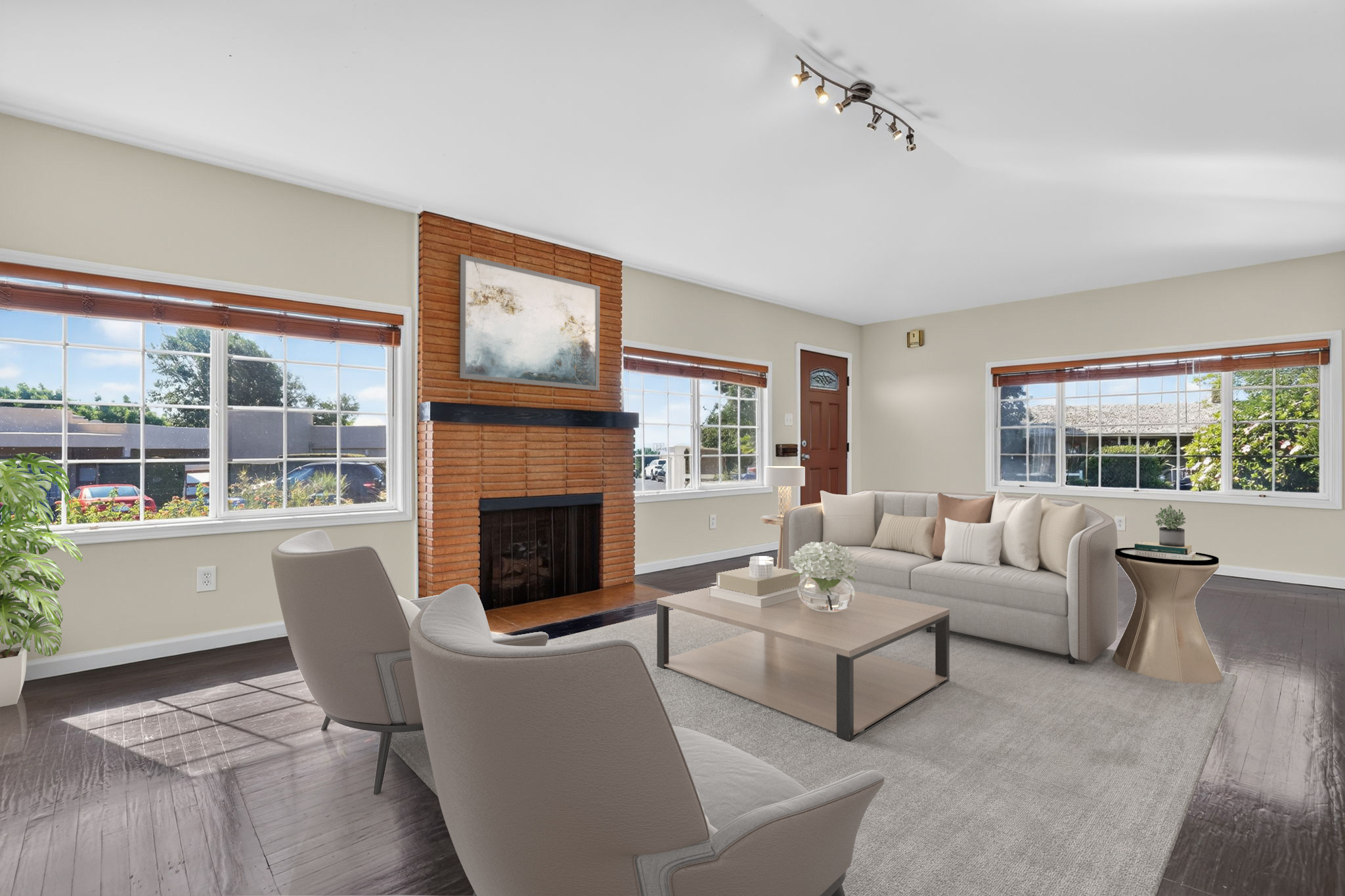 Living room with full-height brick fireplace
