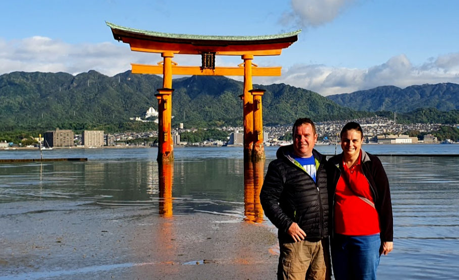 Anne and Tony at the Torii Gate on Miyajima Island in Japan