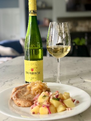 Pork chops and warm potato salad paired with Trimbach Riesling