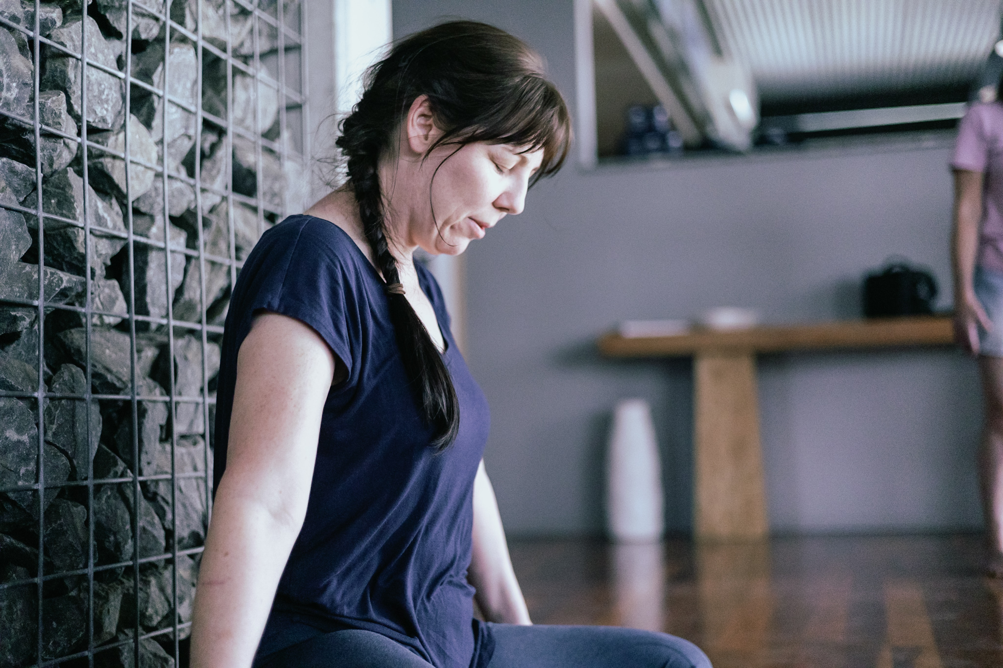 A woman moving, seen from behind