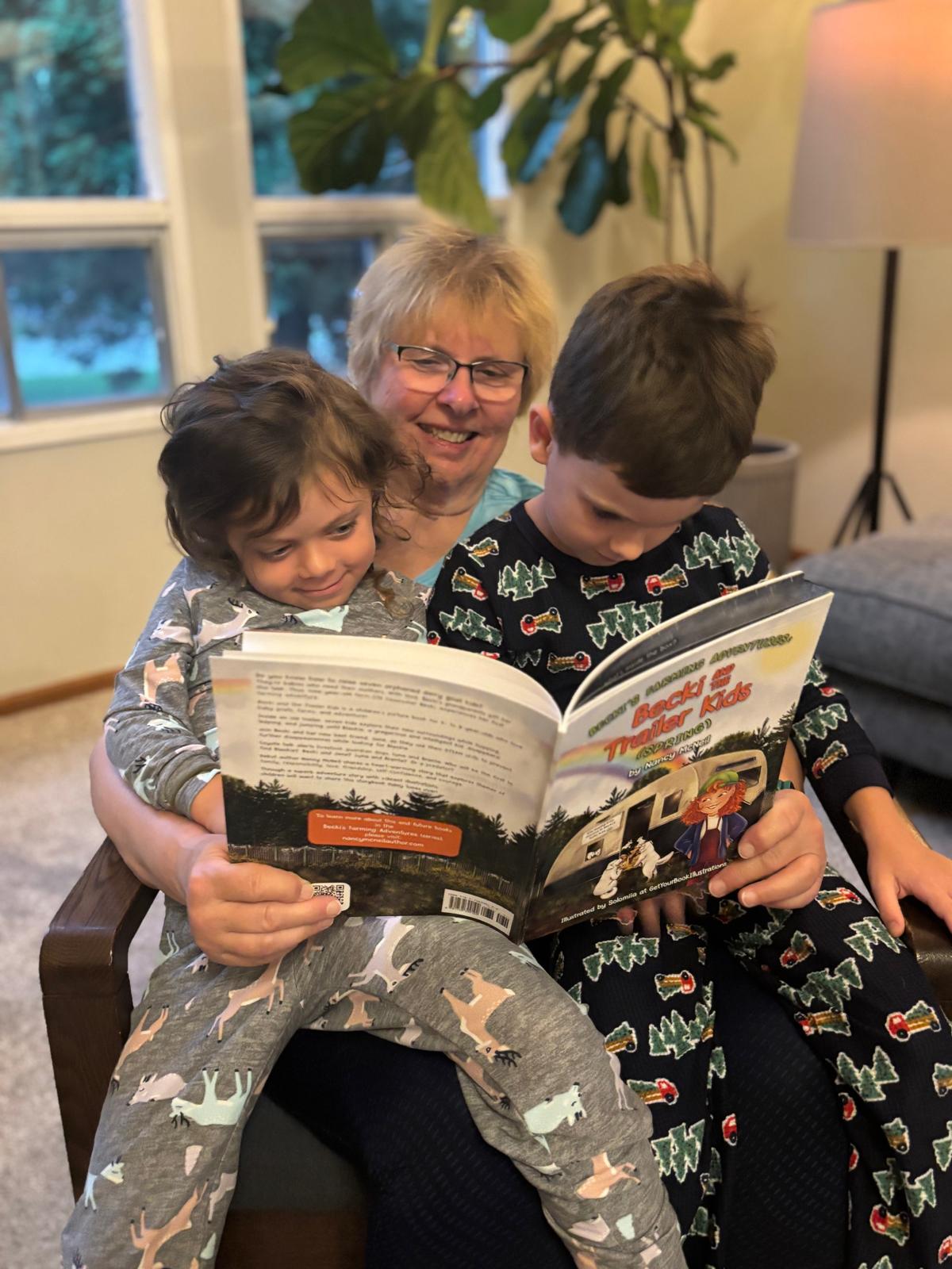 Grandma reading children's picture books to her grandkids
