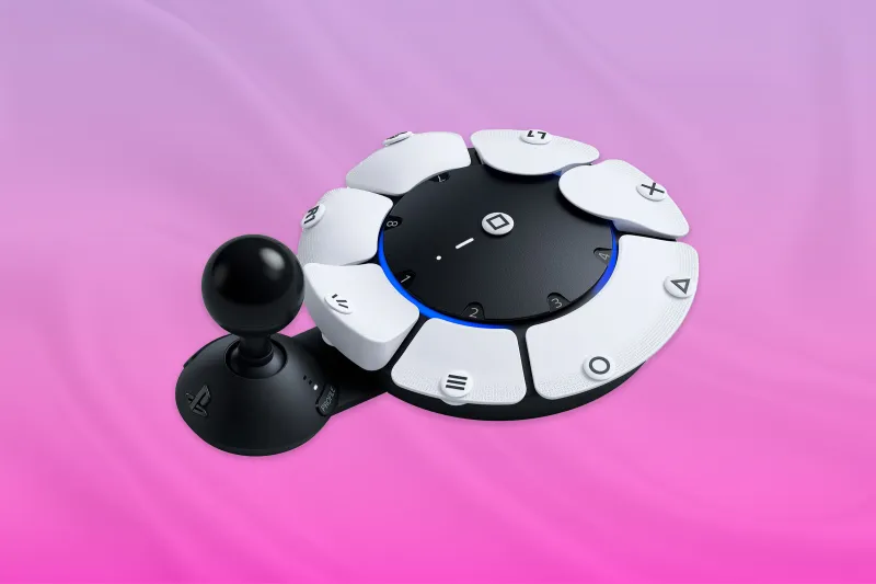 Controle acessível do PS5 ele é circular, tem vários botões do joystick, como o triângulo, X, quadrado e bola e outros atalhos do controle. Também existe um joystick simulando o controle analógico.