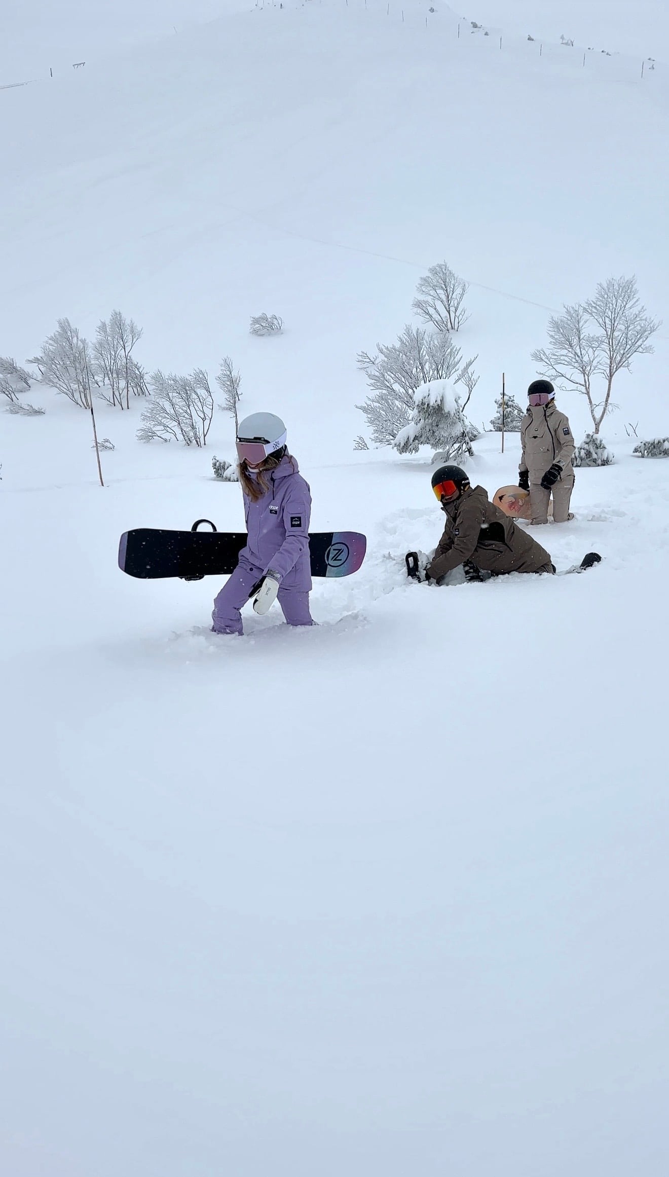 Snowboarders on the slopes