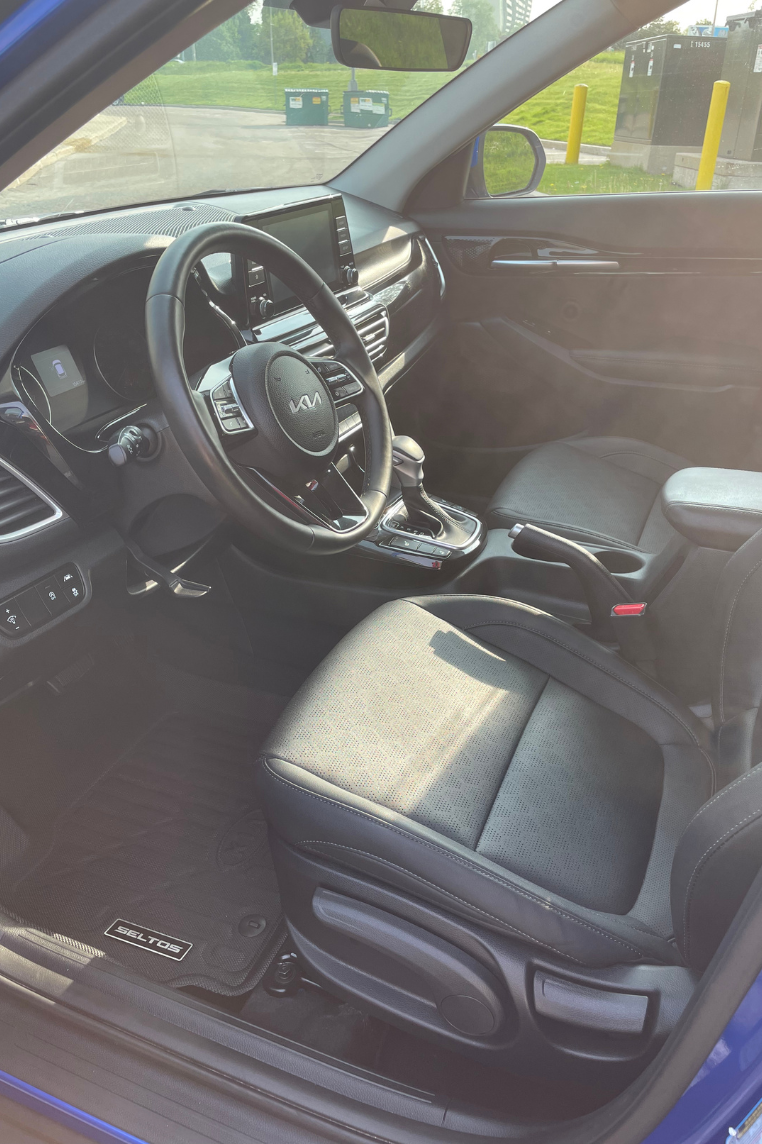 Top Choice's Interior Detailing - Immaculate and polished car interior, showcasing clean upholstery and shiny dashboard, reflecting our thorough detailing craftsmanship.