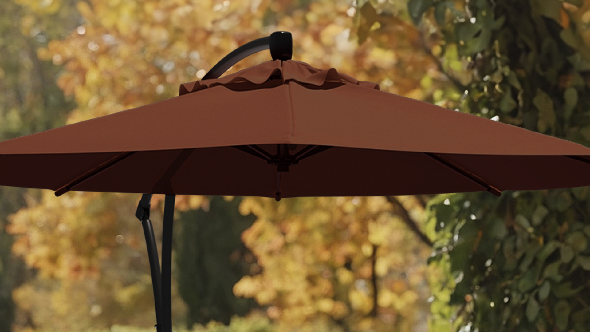 Close-up of the Bayside Series 9ft umbrella canopy in Sunbrella Henna color, showcasing the durable fabric and rich, fall-inspired tone that complements seasonal patio décor.