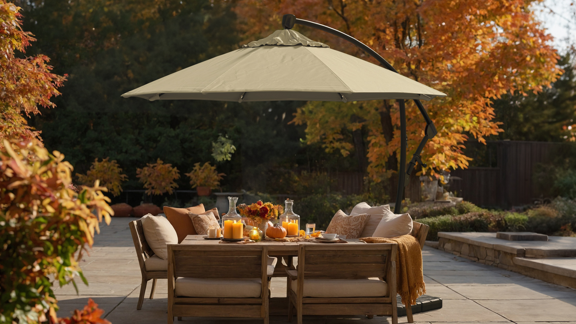 Close-up of the Bayside Series 9ft umbrella canopy in Sunbrella Antique Beige color, showcasing the neutral, elegant fabric that blends seamlessly with fall-themed patio décor.