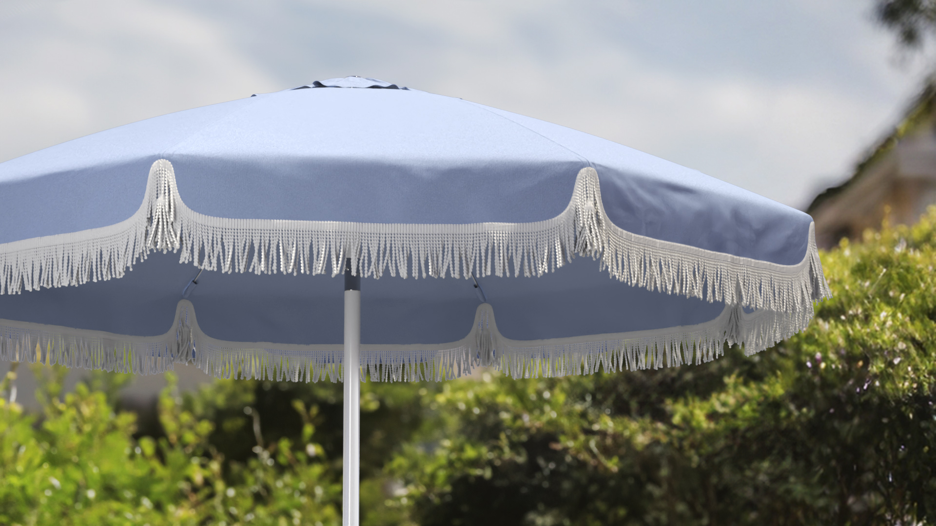 California Umbrella with Air Blue Shade Legacy canopy featuring white fringe, tassels, and binding, offering a classic and stylish look for outdoor spaces.