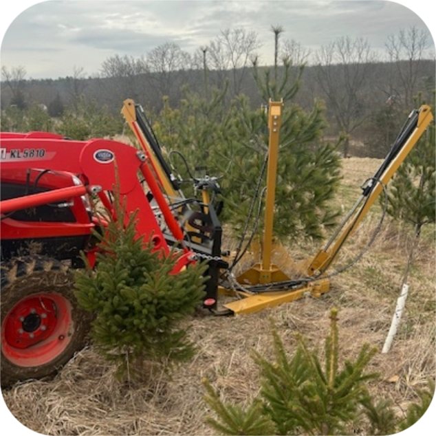 26 inch Kompact Tree Spade on a Mini stand on skid steer