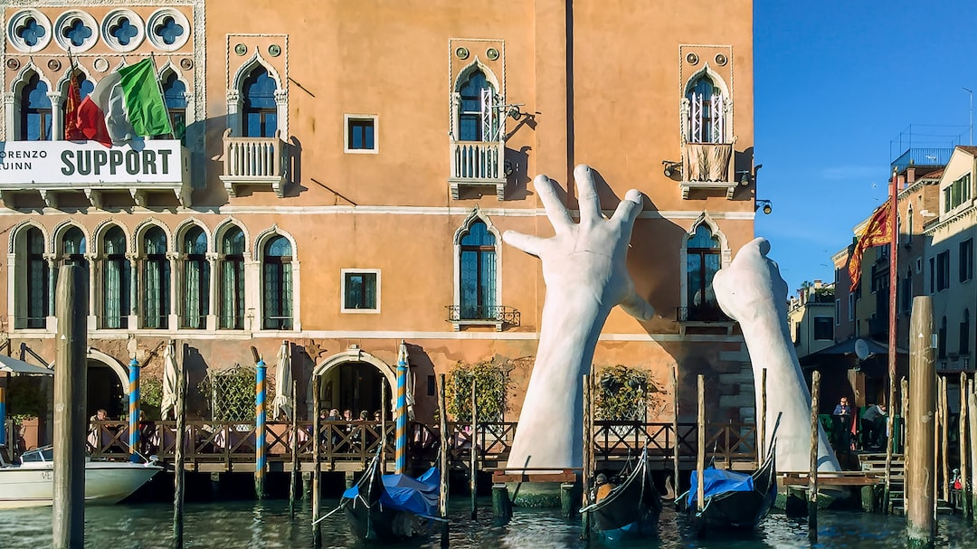 Picture of Lorenzo Quinn’s giant hands sculpture Support in Venice
