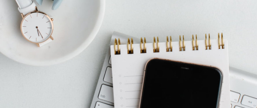 Notebook and planning materials for booking a dietitian consultation