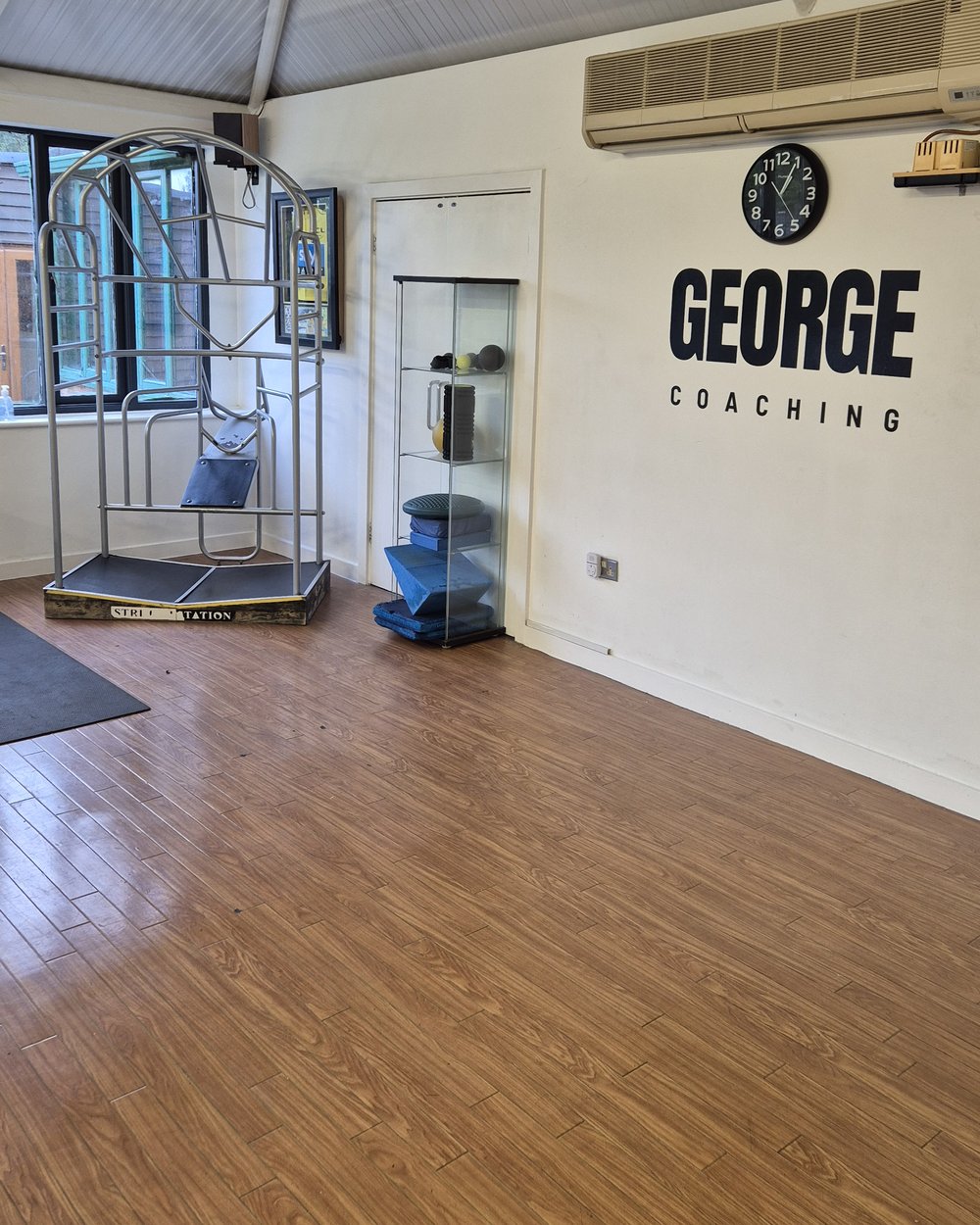 Stretch station and the George Coaching wall logo