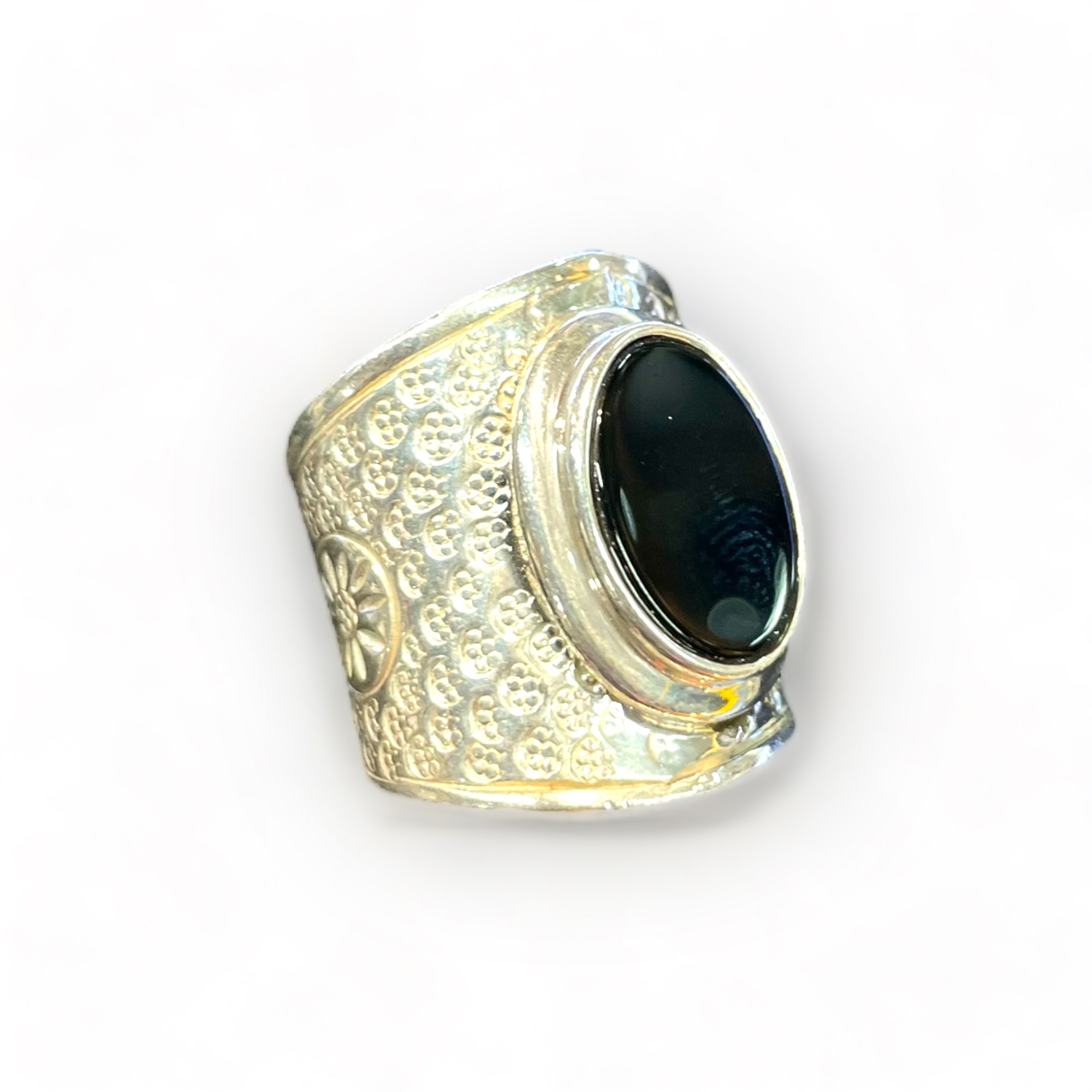 Silver ring, cuff like appearance, with large onyx stone