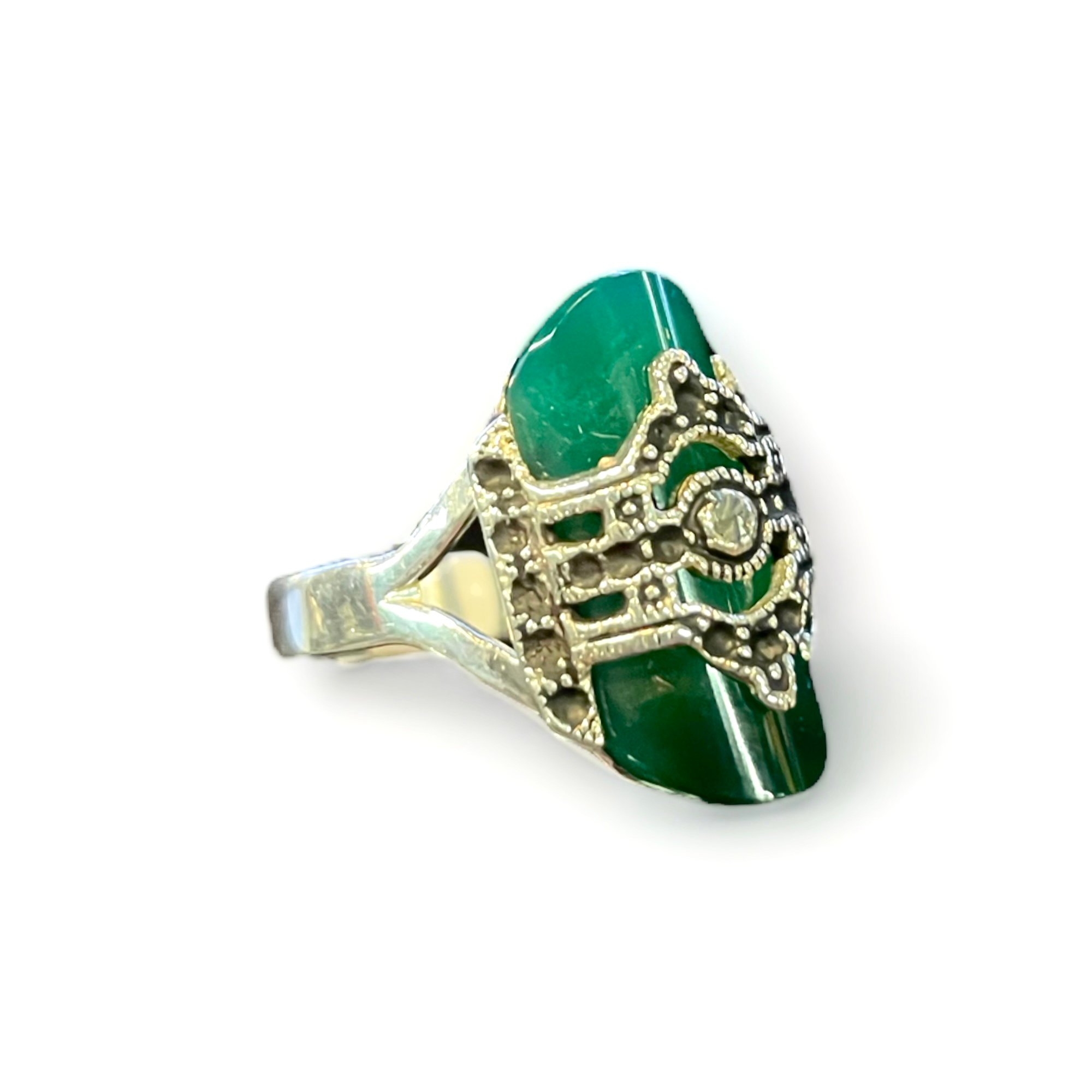 Pointed jade ring with unique design on top