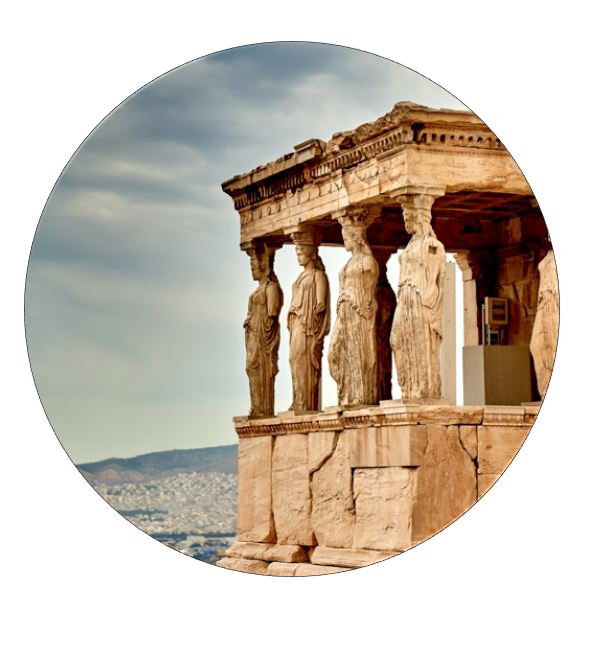 Four ancient marble pillars holding up the roof of a temple are carved in the image of women.