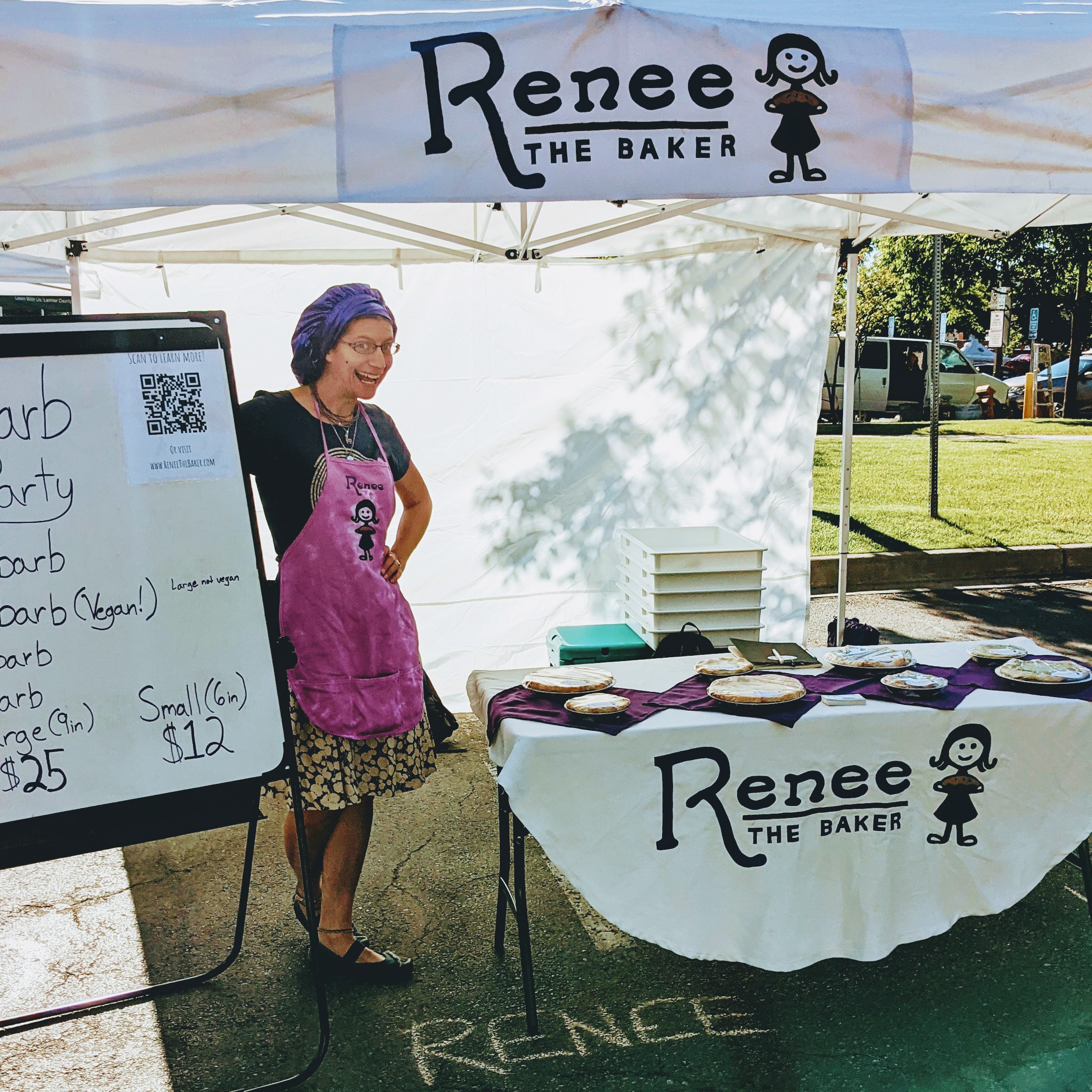 Renee the baker at her booth at the Larimer County Farmers Market