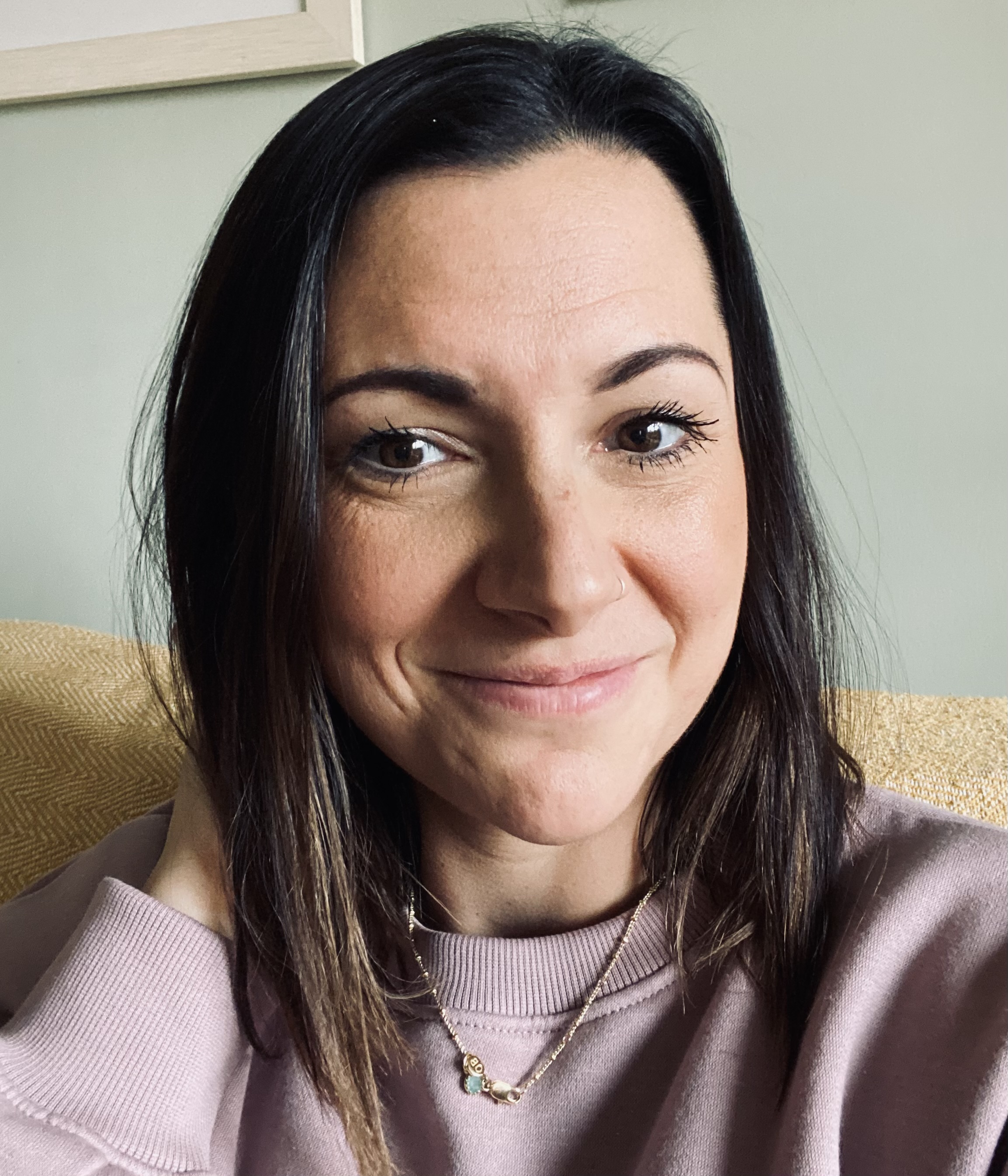 Aimee looking at the camera and smiling :)