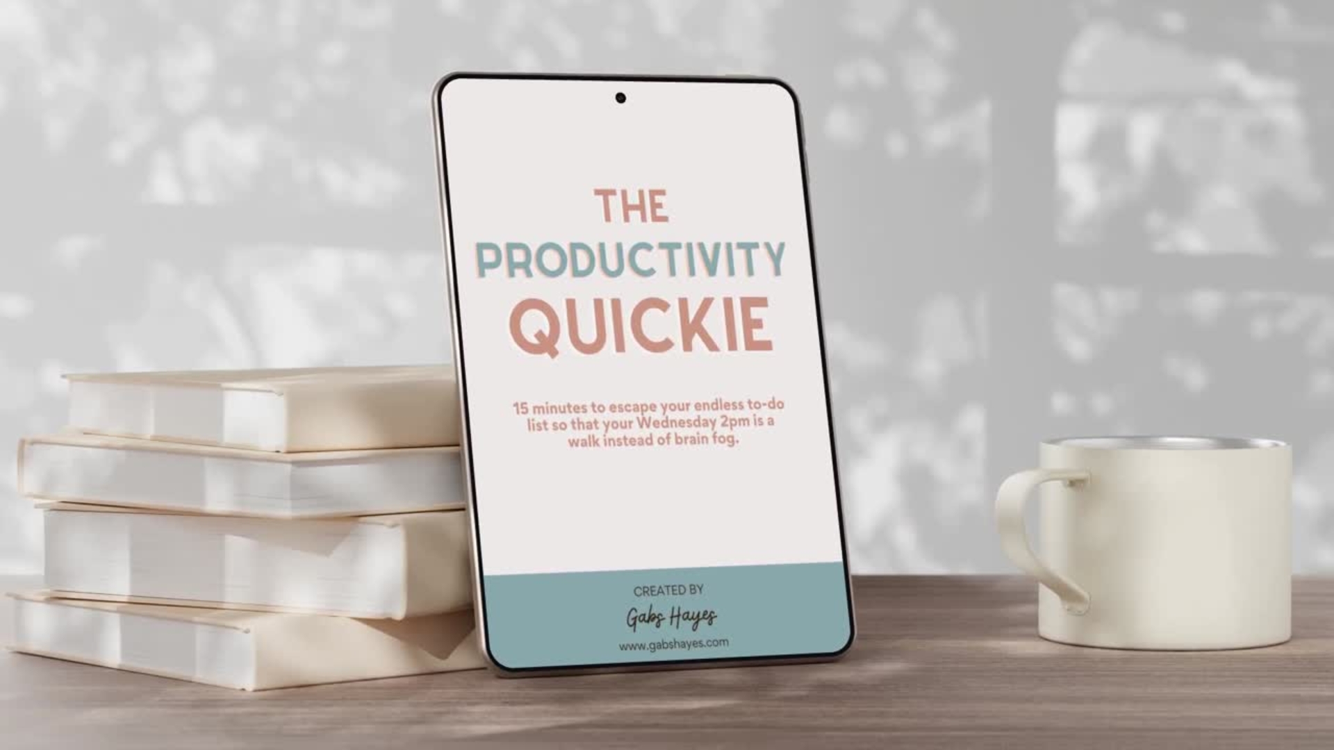 The productivity quickie on ipad leaned against books