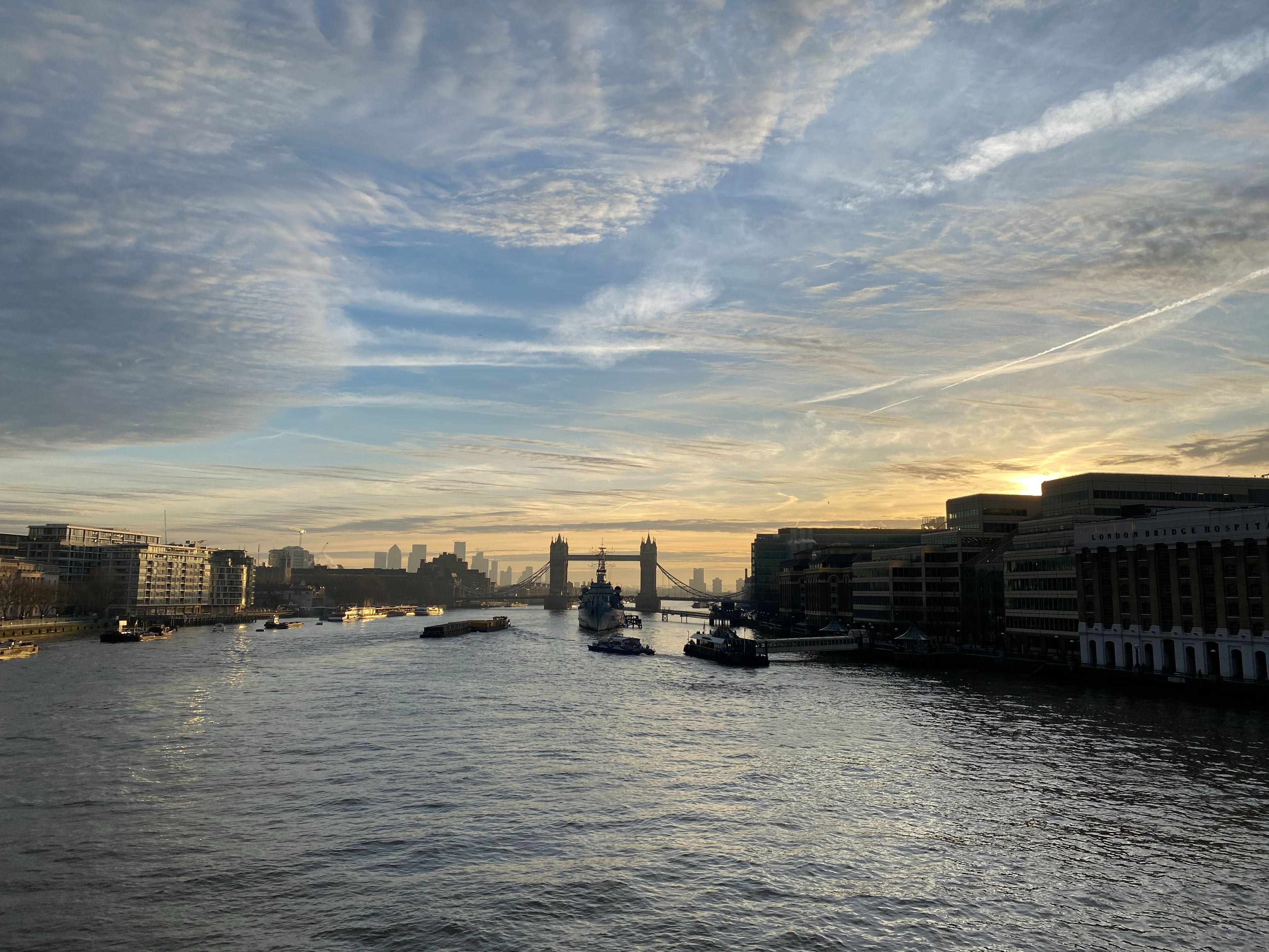 Image of a sunrise over Tower Bridge in the City of London