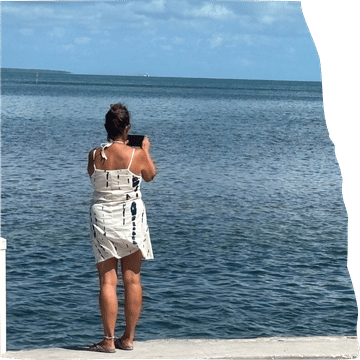 Nancy Carter of Making My Own Lane taking a photo during her solo RV adventure in the Florida Keys