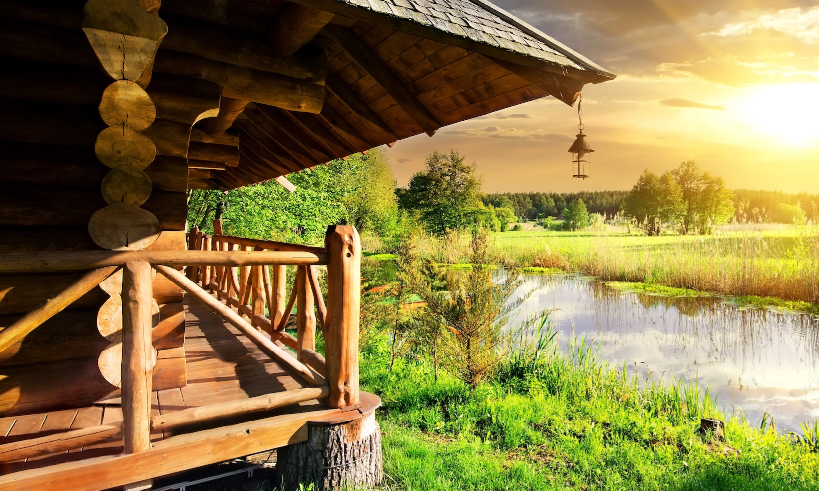 Image of Bryant's Bar:  a log cabin building next to the river