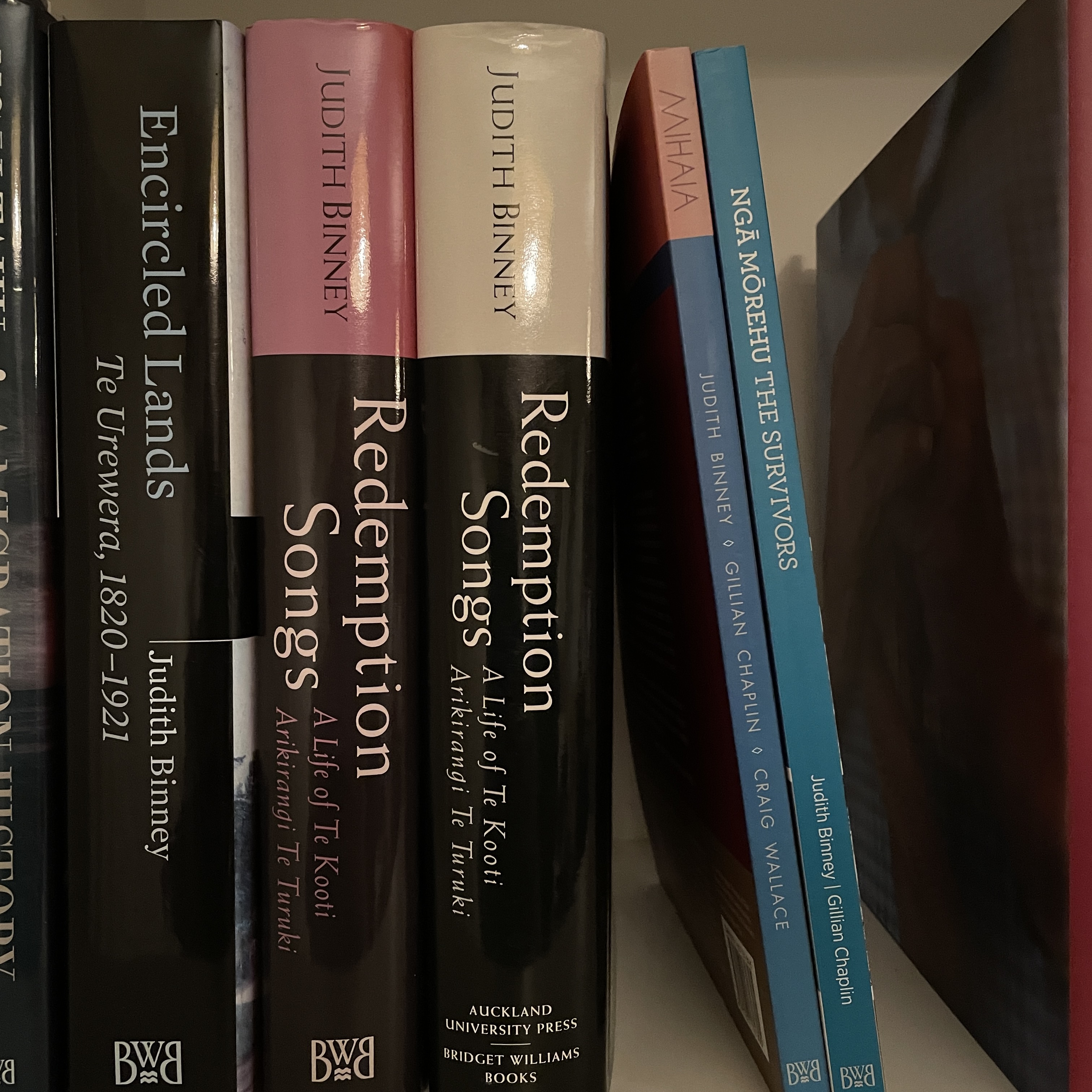 Some of Judith Binney's publications standing on bookshelf