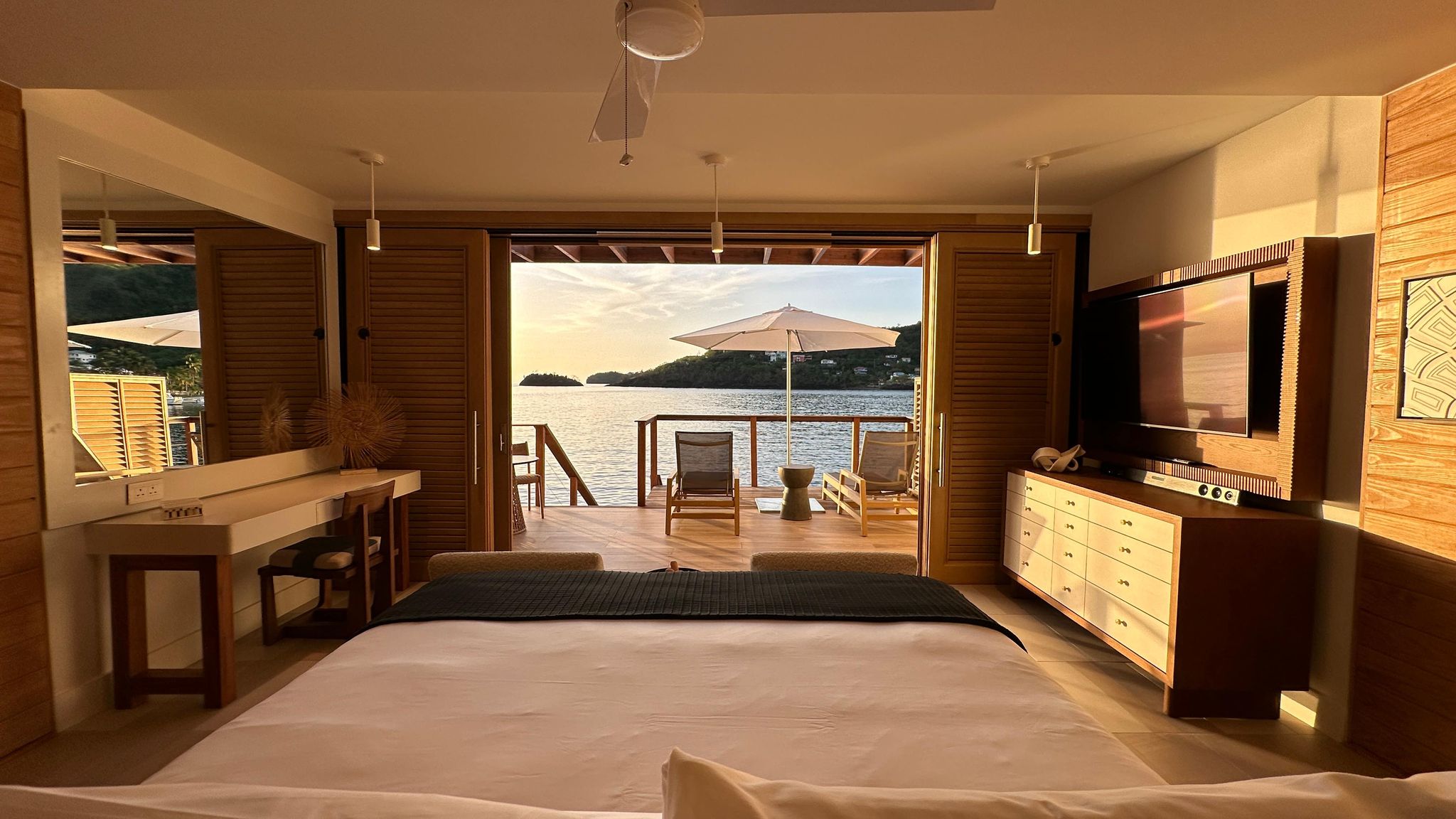 Luxury all-inclusive resort suite with private infinity pool and ocean view, designed for romantic couples.