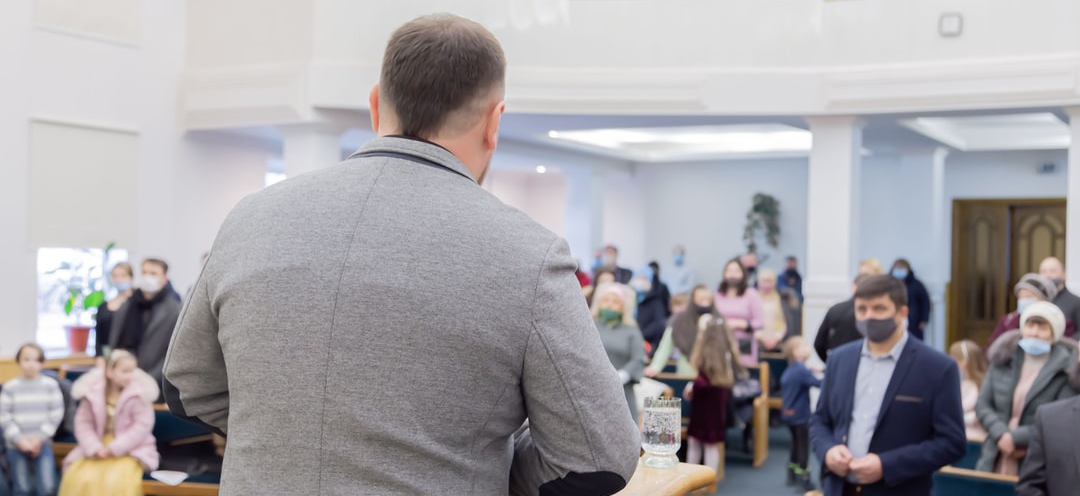 man preaching to church