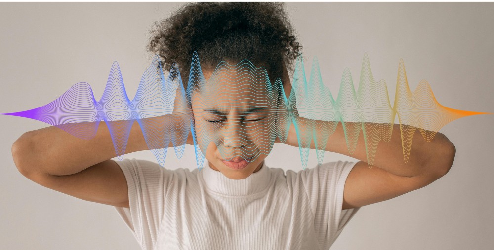 Woman in distress trying to block out food noise