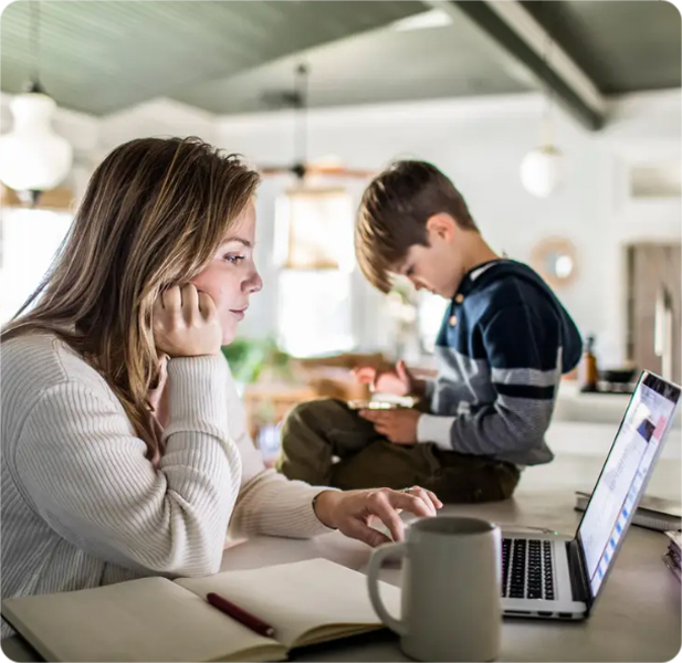 Parent using screen time workbook with child