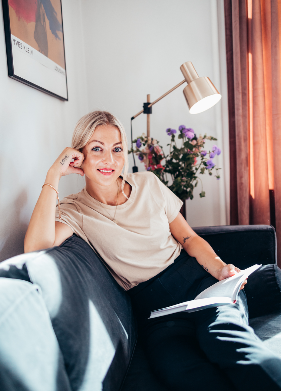 Picture of selfcare coach sitting in Sofa