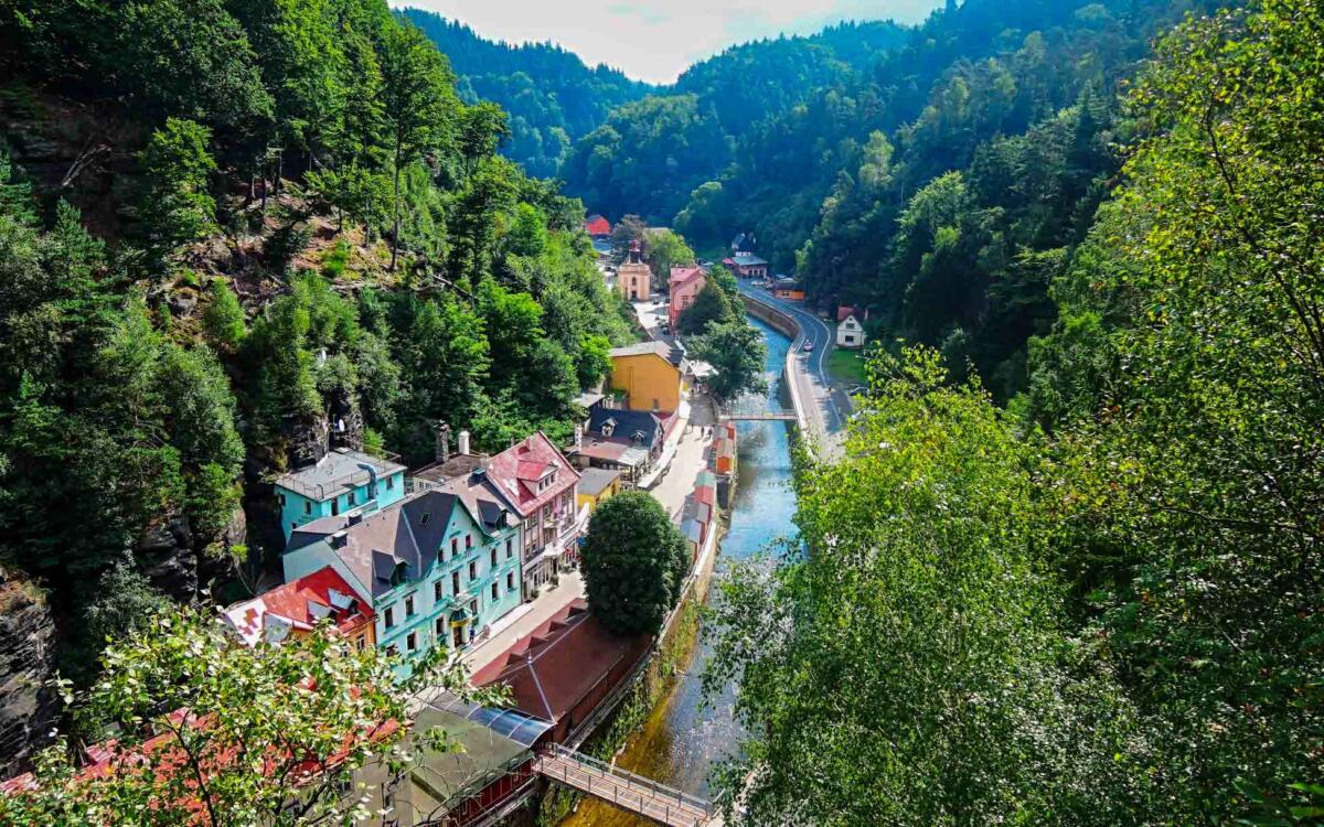 From the iconic Pravčická Gate and dramatic sandstone rock formations to the peaceful Kamenice Gorge and the charming village of Hřensko