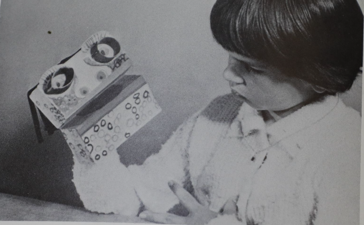 Image of boy with puppet on his hand